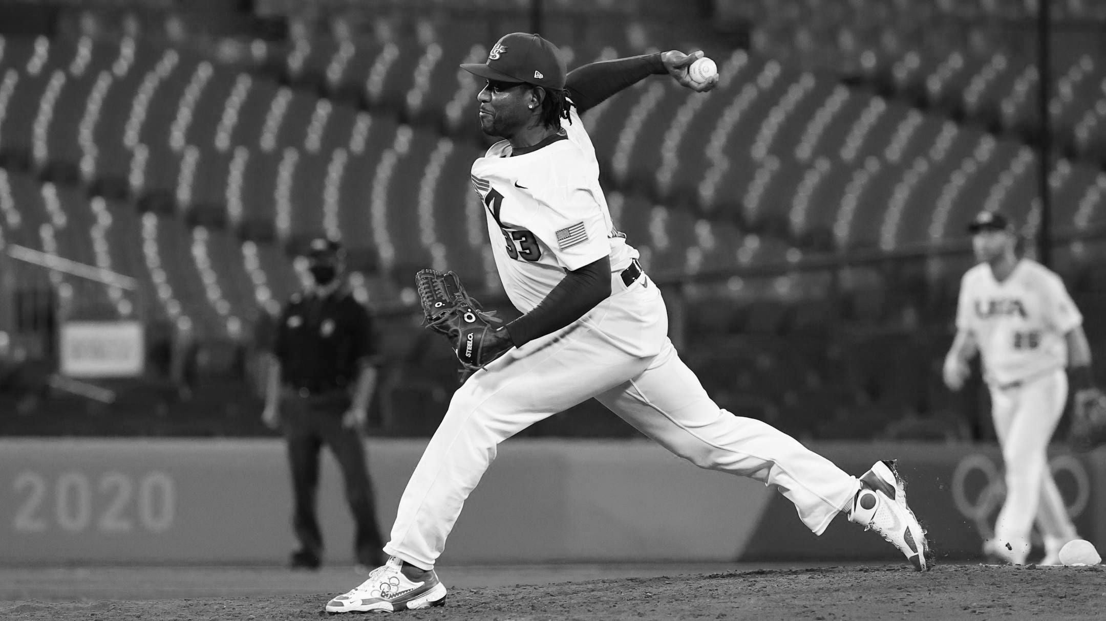 Black and white baseball sales glove